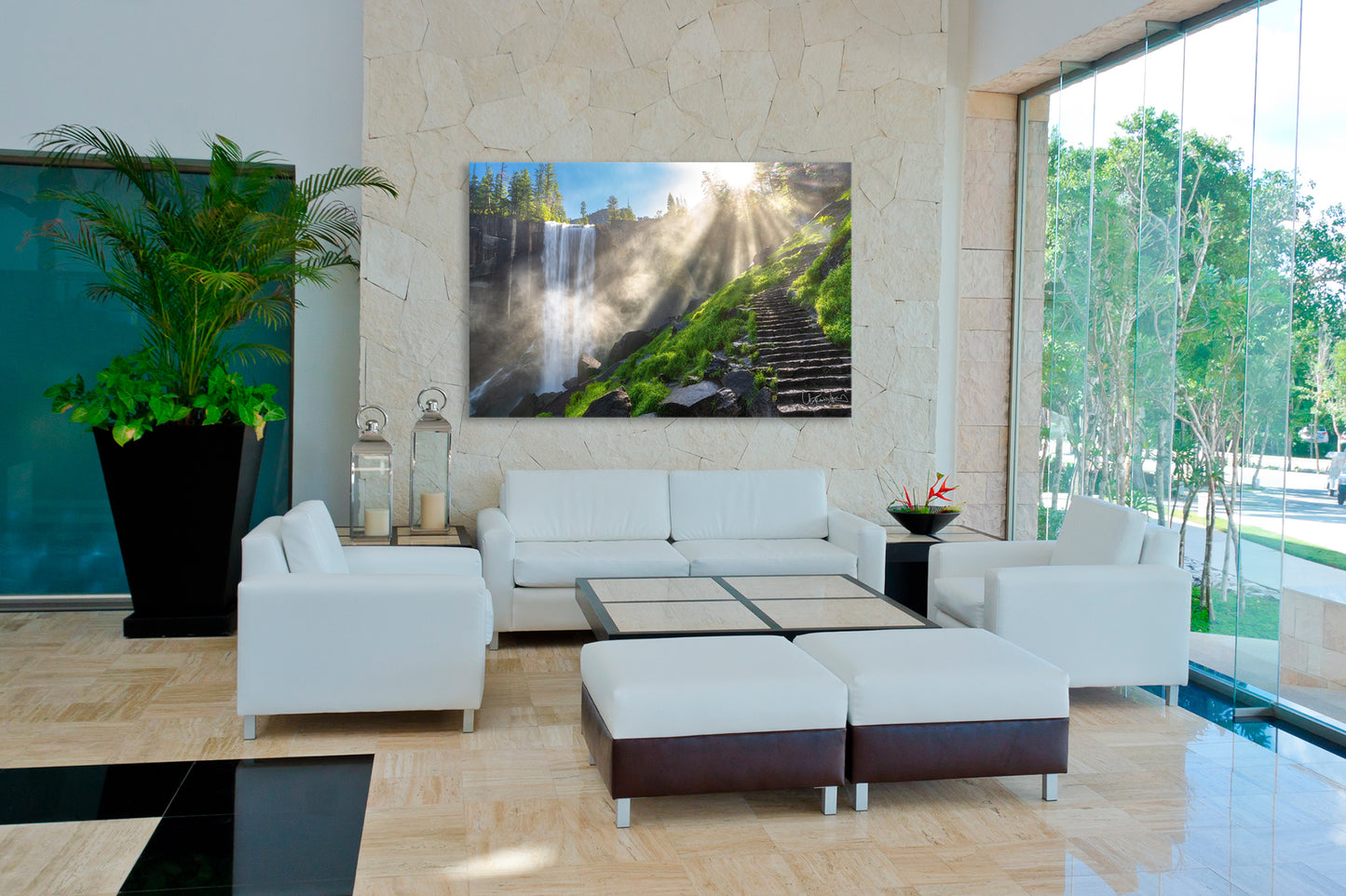 Modern living room with white furniture, a large TV screen, and decorative elements.
