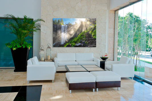Modern living room with white furniture, a large TV screen, and decorative elements.