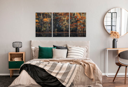 Modern bedroom with a bed, side tables, and wall art.