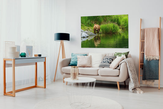 Living room with a large wall-mounted acrylic print of a bear by a river.
