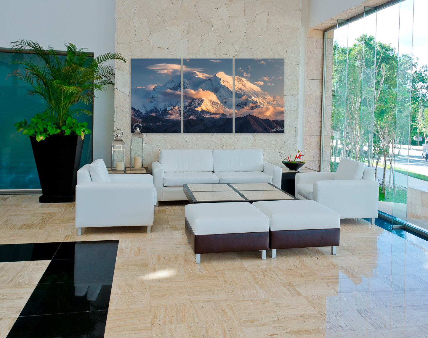 Modern living room with white sofa set and large wall art