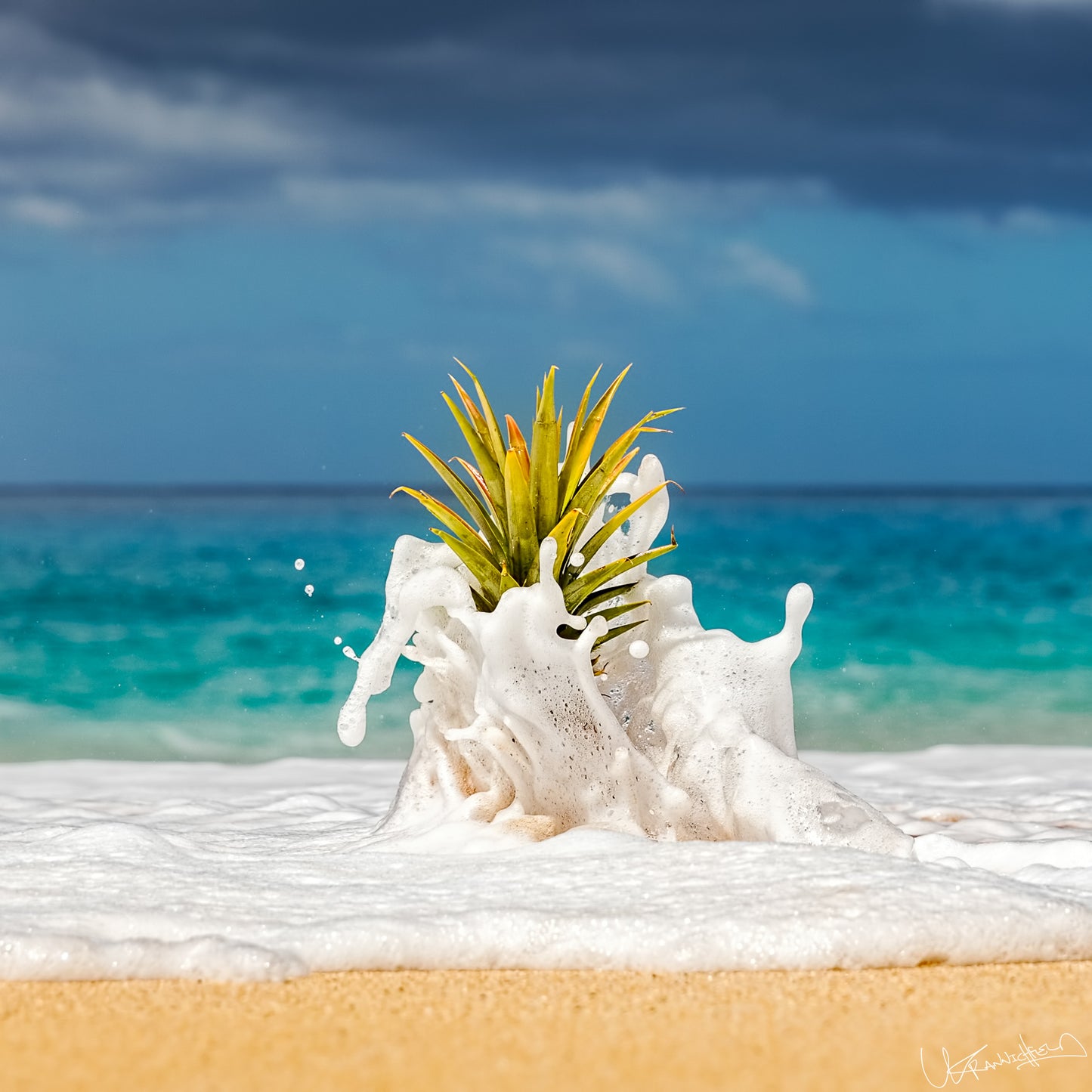 Pineapple on a beach with ocean waves.