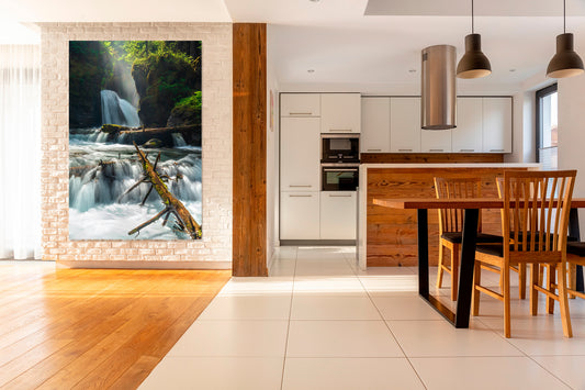 Modern kitchen with a large waterfall photograph on the wall