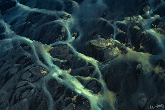 Close-up of a textured green and black surface with intricate patterns